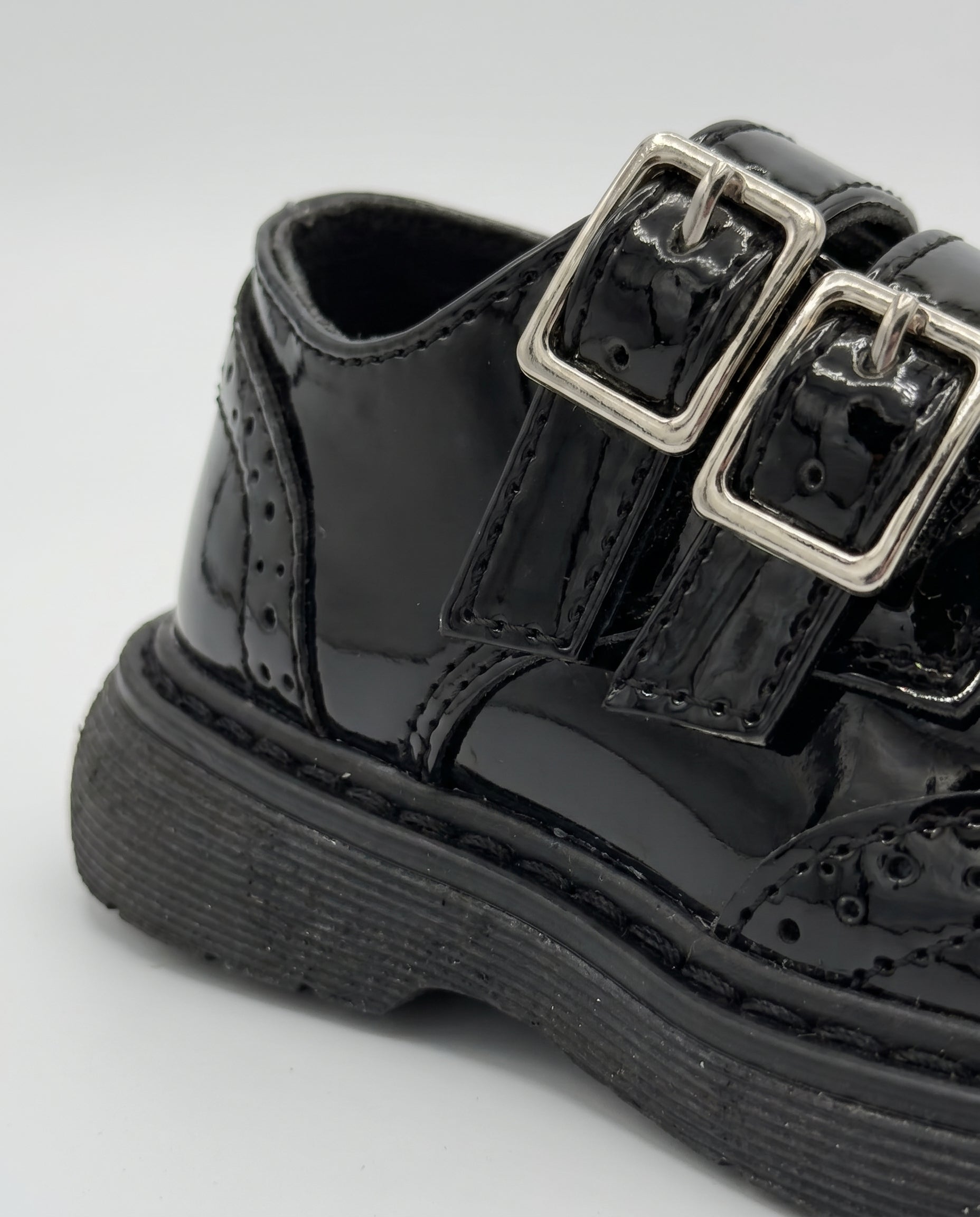 Boys glossy black patent monk shoe โ side profile