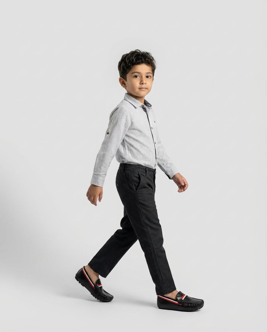 Boys black leather striped loafer โ side profile