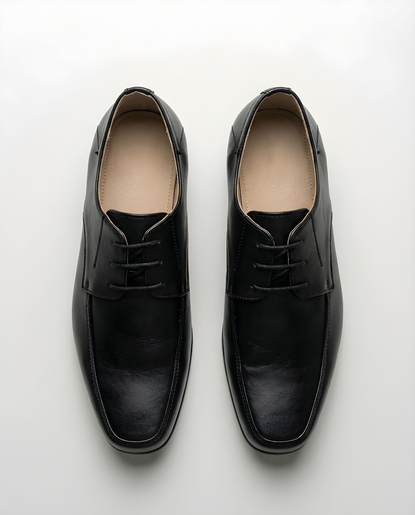 Boys classic black matte derby shoe โ sole view