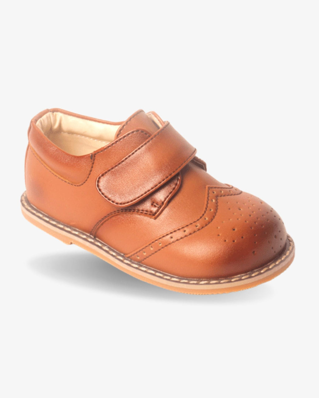 Boys cognac leather wingtip shoe — front view